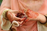 Pale Mehndi and a Golden Lehnga