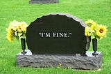 A photo of a headstone inscribed with the words “I’m fine”.