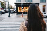 Women walking across a crosswalk