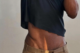 reedy thin. t-shirt and pleats