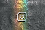 Logo of Instagram in a rustic background having beautiful colors