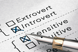 check boxes on list of extrovert, introvert, sensitive, Intuitive aith Introvert and sensitive having x’s crossed on the boxes next to them.