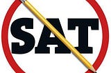 The word “SAT” crossed out by a pencil