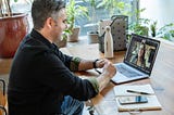 Man working from home, on a zoom call