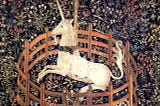 an ancient tapestry depicting a unicorn in captivity