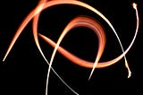 Graphic digital depiction of Yuri-nome bouncing around in huge arcs alone in a dark universe.