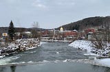 Montpelier, Vermont on a cold winter morning — view from bridge heading into town.