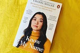 A copy of Know My Name by Chanel Miller against a mustard background.