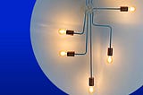 Lightbulbs connected to a hub with wires