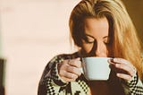 Woman drinking coffee