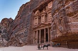 Horse and carts in front of Al Khazneh temple at Petra in Jordan