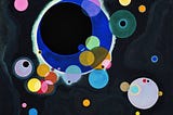 Wassily Kandinsky’s “Several Circles.” In this painting there are about 40 circles of different sizes and colors, some of them overlapping and some not. The background is black. Photo from WikiArt. Public domain.