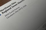 NEORSD envelope on a desk