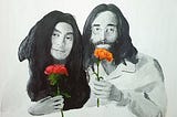 John & Yoko holding flowers