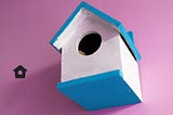 A black twitter “home” icon beside a white and blue bird house.