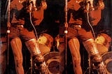 The album cover of The Latest Edition, two John Mayall identical images, with his leg in a cast.