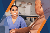 A caregiver smiles at an older adult