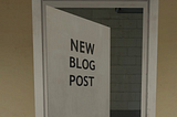 A screenshot of an open door (From The Stanley Parable: Ultra Deluxe) that I’ve edited to read “New Blog Post”