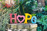 Hope sign in a garden