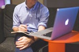 Man Reads Body of Satirical Article after Smirking at Title