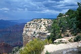 A dramatic view of Mexico’s Copper Canyon, with blue skies and jagged rockfaces, a challenge for climbing!