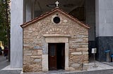 How a small church in Athens ended up under the arcades of a building