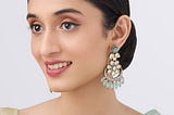 Elegant Chandbali and Stylish Stud Earrings: Timeless Jewelry Pieces