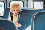 boy in school bus