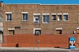 Brick building on street