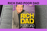 I Am Re-Reading Robert Kiyosaki’s “Rich Dad Poor Dad” And Here Is Why?