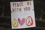 “Peace be with you” poster at Christchurch mosque shooting memorial, Thursday 21 March 2019