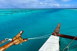 Leaving Aitutaki on the traditional vaka, Marumaru Atua. Photo © Bryce Groark, Moonjelly Foundation