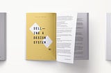 A book spread showing content related to selling a design system