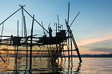 Silhouette of the traditional fishing structure built with bamboo called Bagang, typical of Sabah, Borneo.