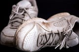 The Tips of His Sneakers