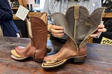 Austin Boot War Kicks Up Dust