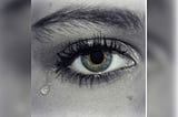 An image of an eye with tears dropping from it to show how hurt some writers are by medium partner program.