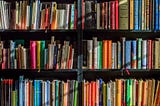 Three shelves of books