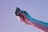 Hand holding litecoins
