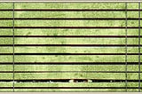 Eyes peeping through venetian blinds