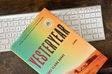 author’s image of her copy of Yesteryear sitting on a white keyboard