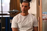 Chicago PD’s Dante Torres (actor Benjamin Levy Aguilar) in white T-shirt