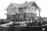 old, black and white photo of the Roeder Home with pond in the front yard