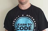 A photo of myself wearing my new shirt from Coder Academy. It reads Learn To Code