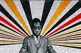 This mosaic mural of James Baldwin is artwork by Rico Gatson and is displayed in the 167th Street subway station in the Bronx. The artwork features glass mosaic tiles with James Baldwin in the middle. Baldwin is looking forward and wearing a suit and tie. Arrays of red, gold, black, and white shine out from behind his head and shoulders.