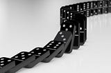 Dominoes + Gravity