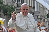 Pope Francis waving to crowd