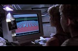 People in 1993 looking at a computer screen, where the file system is presented as a red box with blue boxes on top and connected to other red boxes by green lines.