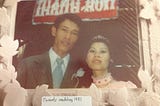 Aged photo of my parents on their wedding day in 1981