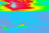 The same image of the landscape presented before, but in thermal infrared imagery color scheme: red-green-yellow-blue
